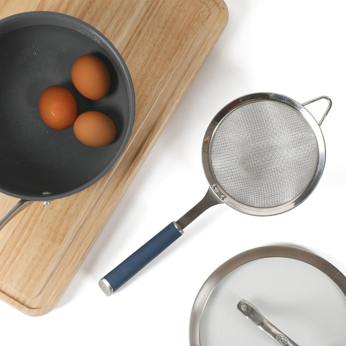 Calphalon Prime Edge 5-Inch Stainless Steel Strainer, Fine Mesh Kitchen Colander Strainer with Thermoplastic Rubber Handle, Sifter for Rinsing, Draining & Straining Food, Navy