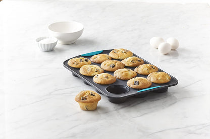 Trudeau Silicone Muffin Pan, 12 Cavities, Fuchsia (Model: 05115197KR)