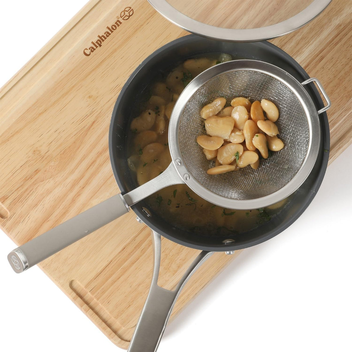 Calphalon Prime Edge 5-Inch Stainless Steel Strainer, Fine Mesh Kitchen Colander Strainer with Thermoplastic Rubber Handle, Sifter for Rinsing, Draining & Straining Food, Navy