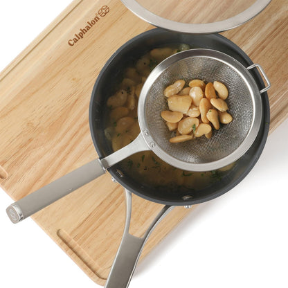 Calphalon Prime Edge 5-Inch Stainless Steel Strainer, Fine Mesh Kitchen Colander Strainer with Thermoplastic Rubber Handle, Sifter for Rinsing, Draining & Straining Food, Navy