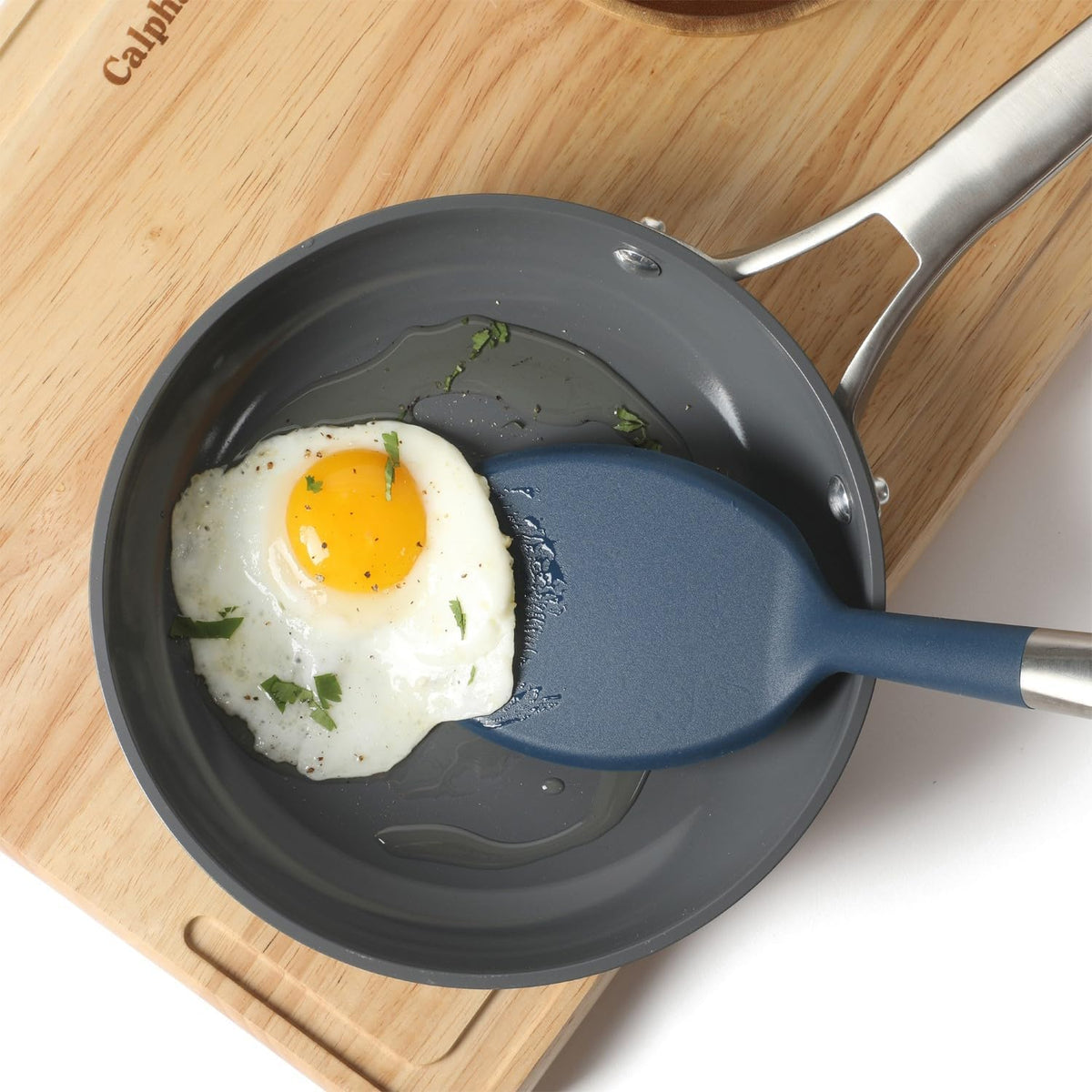Calphalon Slotted Turner, Kitchen Flipping Spatula, Slotted Spatula, Stainless Steel Turner with Silicone Heat Resistance Handle, Nonstick-Safe Spatula for Draining and Flipping (Navy)