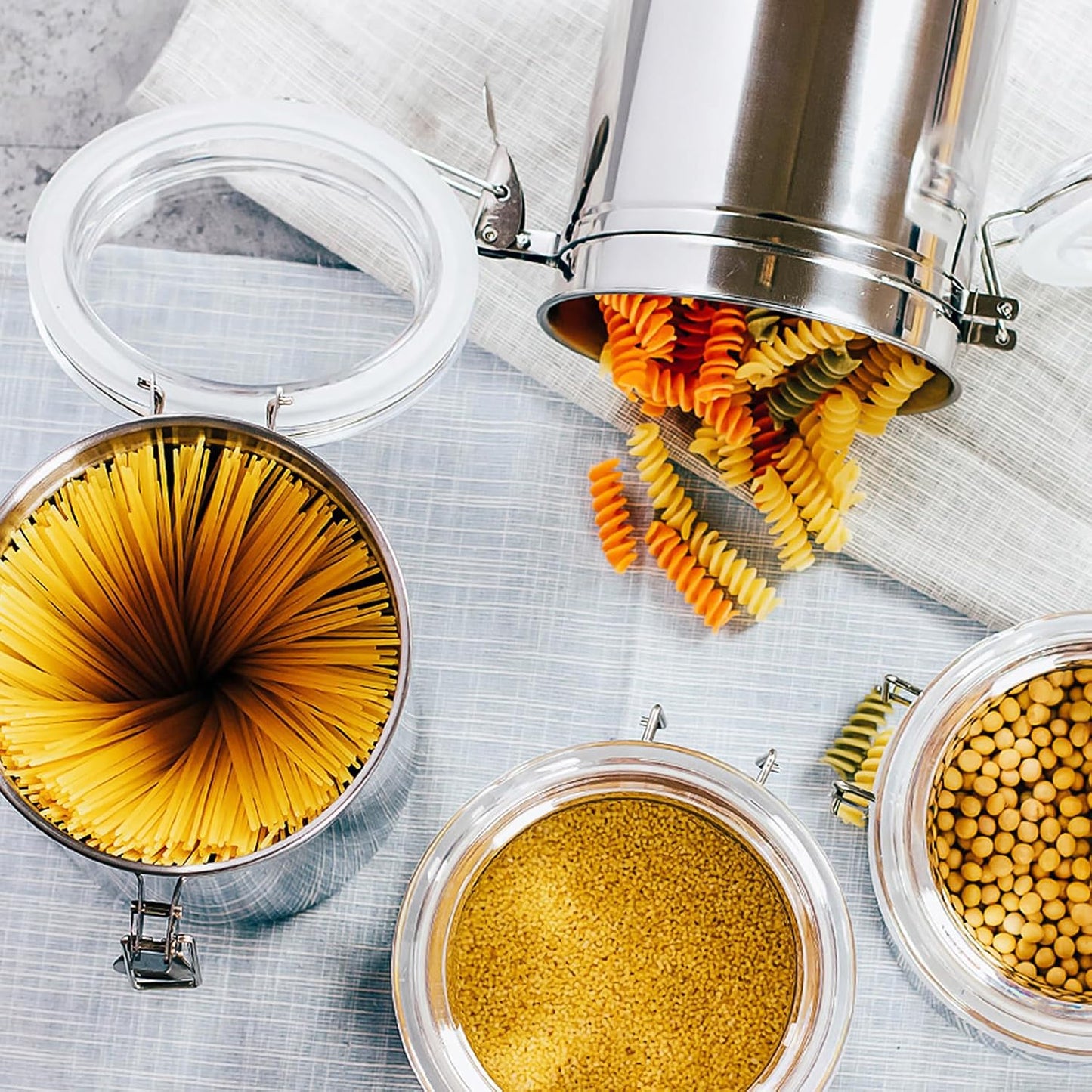 ENLOY 165oz Stainless Steel Airtight Canister for Kitchen, Large Flour Coffee Bean Tea Cereal Sugar Cookie Metal Food Storage Canisters with Clear Lid and Sturdy Locking Clamp (7.7 * 7.7 * 8.4in)