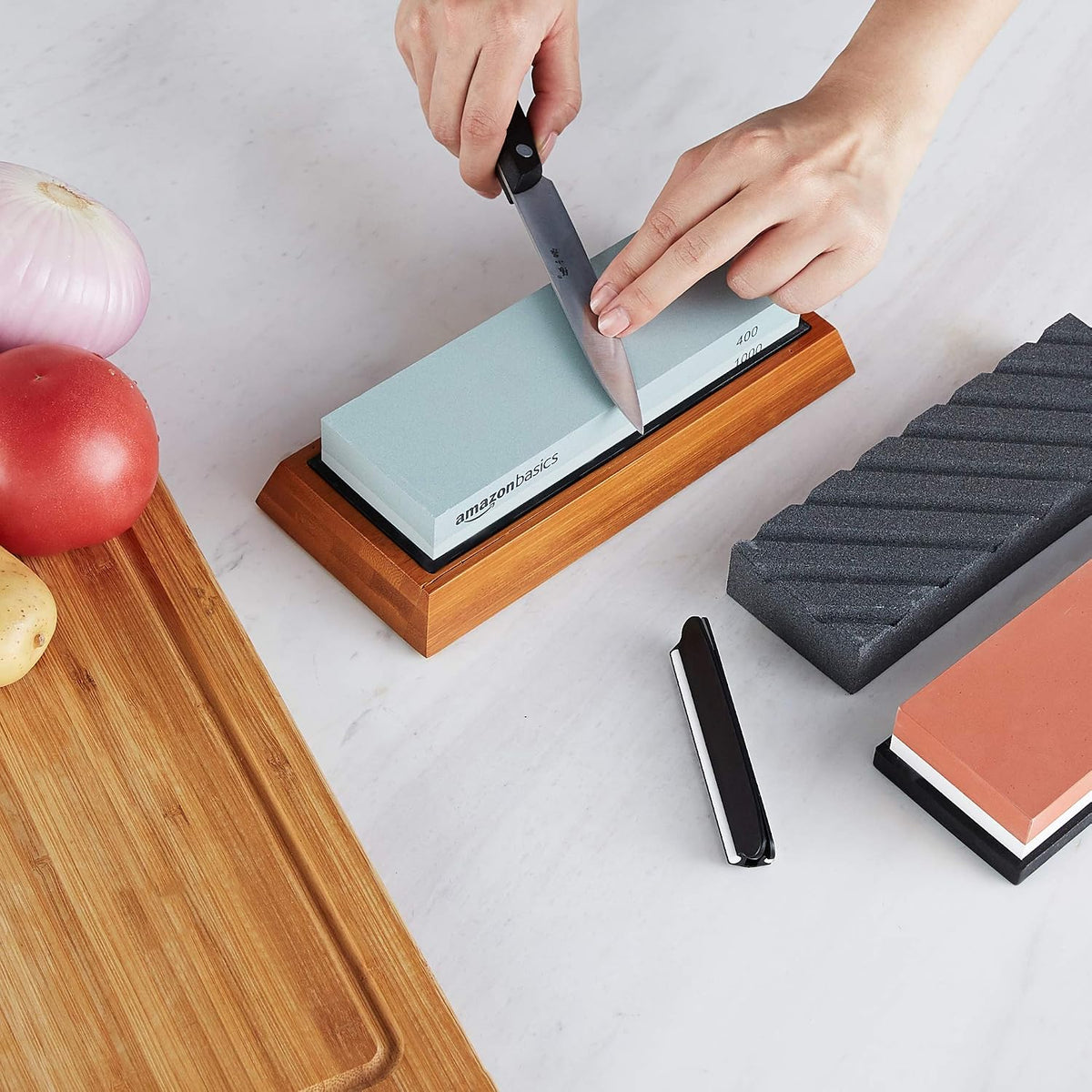 Amazon Basics Whetstone Knife Sharpening Stone, Double-Sided 1000/6000 Grit with Angle Guide, Non-Slip Bamboo Base, Black & Grey