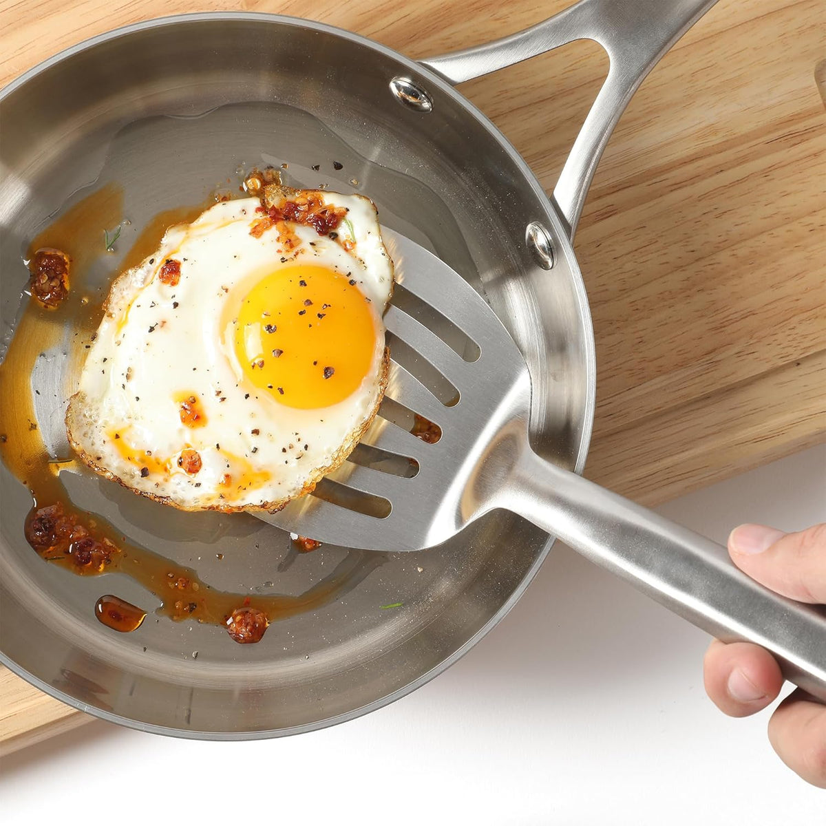 Calphalon Slotted Turner, Kitchen Flipping Spatula, Slotted Spatula, Stainless Steel Turner with Silicone Heat Resistance Handle, Nonstick-Safe Spatula for Draining and Flipping (Navy)