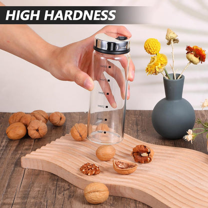 4Pcs Large Salt Pepper Shakers with Adjustable Outlet Holes Moisture-Resistant Seasoning Shakers Glass Shaker Bottles Clear Spice Seasoning Cans for Kitchen Restaurant BBQ Camping (300ML)