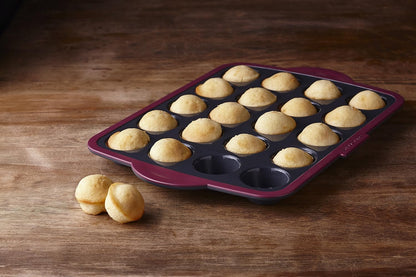 Trudeau Silicone Muffin Pan, 12 Cavities, Fuchsia (Model: 05115197KR)