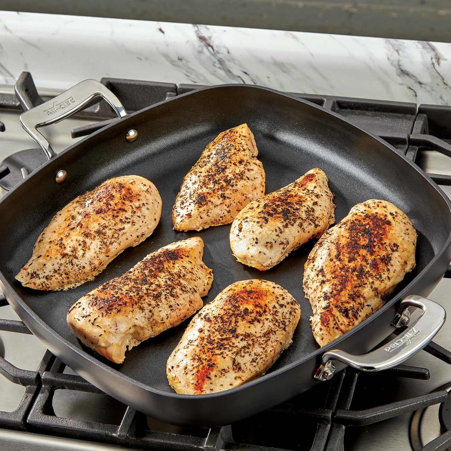 All-Clad Silicone Grip Set: 100% Silicone Flexible & Heat Resistant Ribbed Grip Set - Perfect for Cast Iron, Steel, or Glass, (2-Piece), Black/Grey