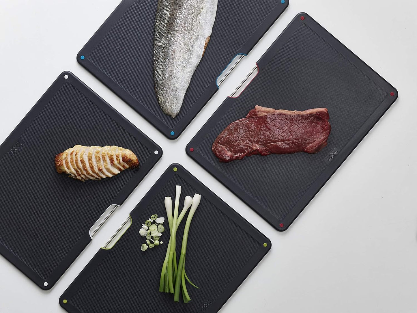Joseph Joseph Folio 4-Piece Colour coded Cutting Board Set, Stainless Steel Slimline case for organized Kitchen storage, Black