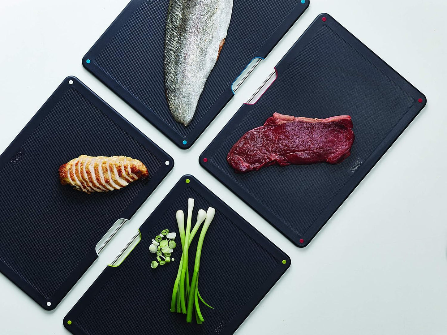 Joseph Joseph Folio 4-Piece Colour coded Cutting Board Set, Stainless Steel Slimline case for organized Kitchen storage, Black