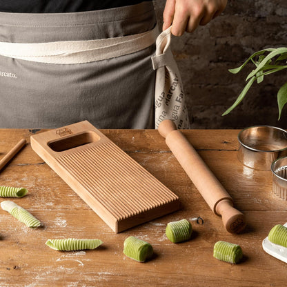 Marcato Made in Italy GNOCCHI LIKE A PRO 7-piece Kit. Includes Gnocchi board, Garganelli accessory, 2 pastry rings, Rolling Pin, Short Apron, and Cookbook